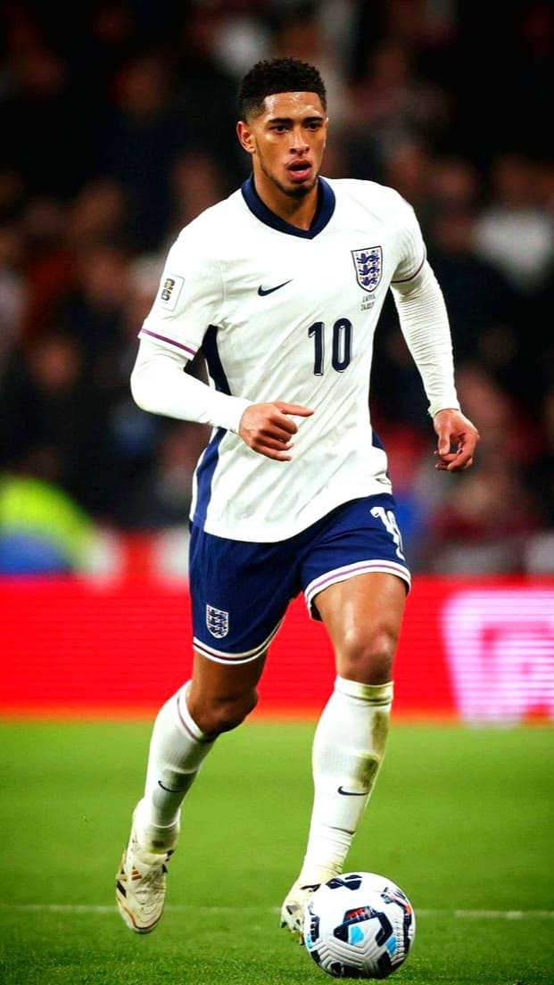 A soccer player in an England jersey with number 10 runs on the field, focused on dribbling the ball during a match—an action-packed moment perfect for fans enjoying the game through Brasil IPTV.
